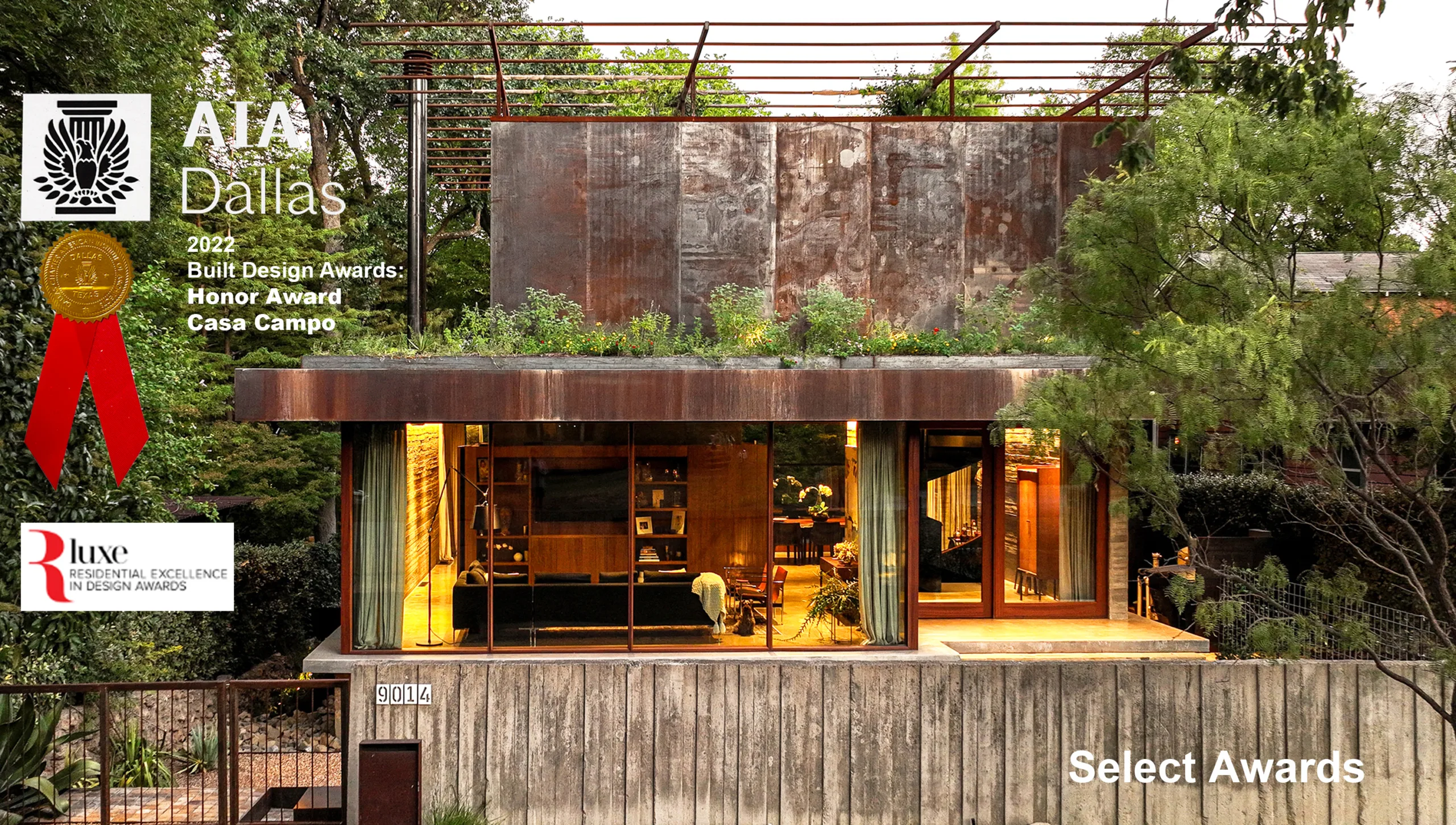A house with a metal roof and a tree in the background.
