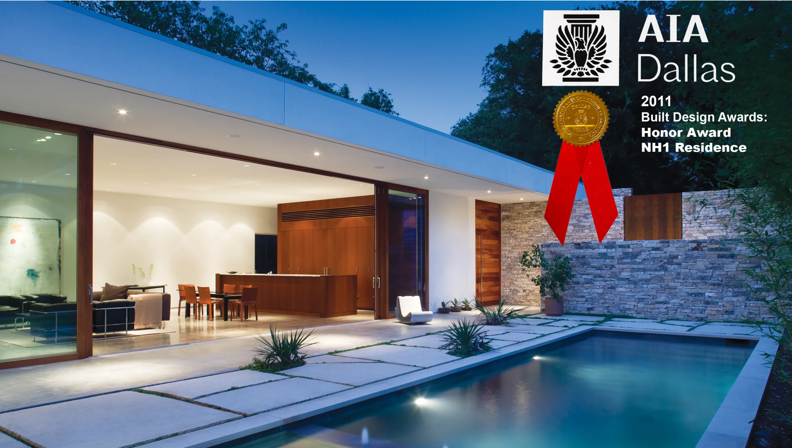 A home with a pool and a red ribbon.